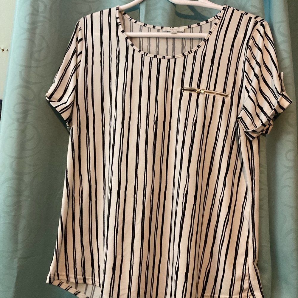 Black and white dressy shirt with cute zipper accent on pocket